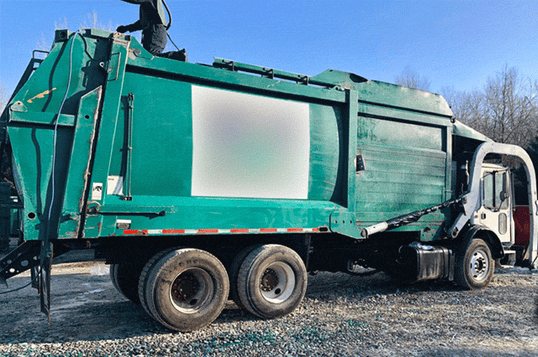 heavyequip-kentuckiana-dustless-blasting---dean-and-james-martin---garbage-truck-painted
