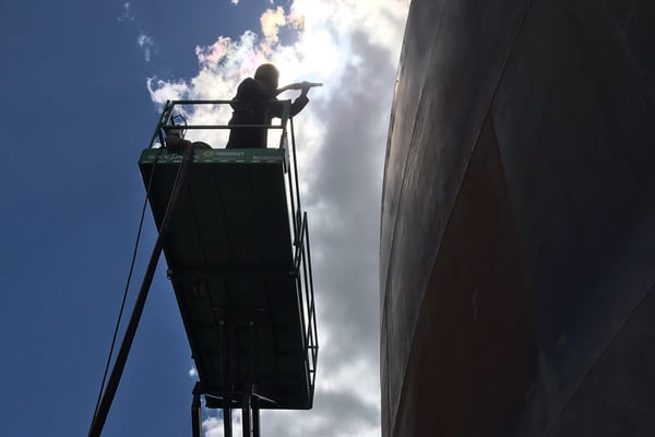 Industrial sandblasting surface preparation for industrial coatings