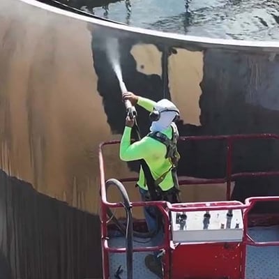 Blasting_open_water_tank_lift
