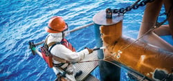 removing rust from large offshore pipes