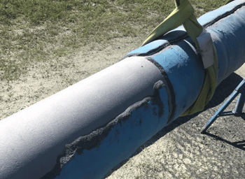 thick powder coating removal from a pipe