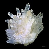 A quartz crystal, the most common form of crystalline silica.