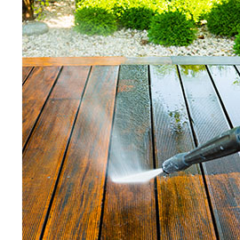 pressure washing a patio deck