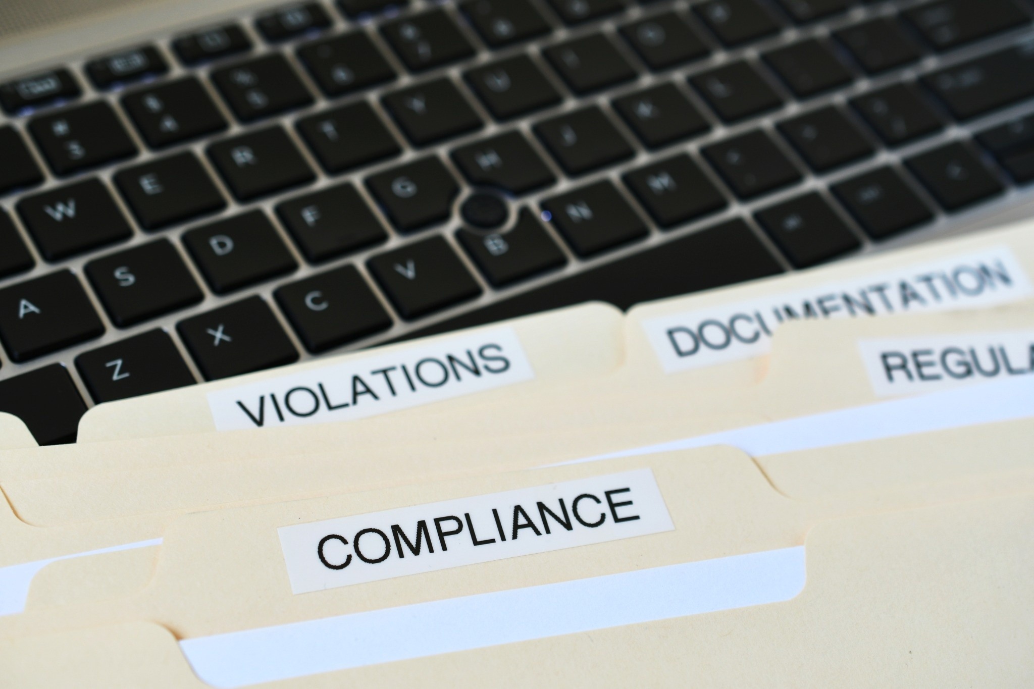 file-folders-with-words-compliance-violations-do-2025-03-11-18-21-07-utc_compressed