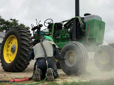 Sandblasting heavy machinery