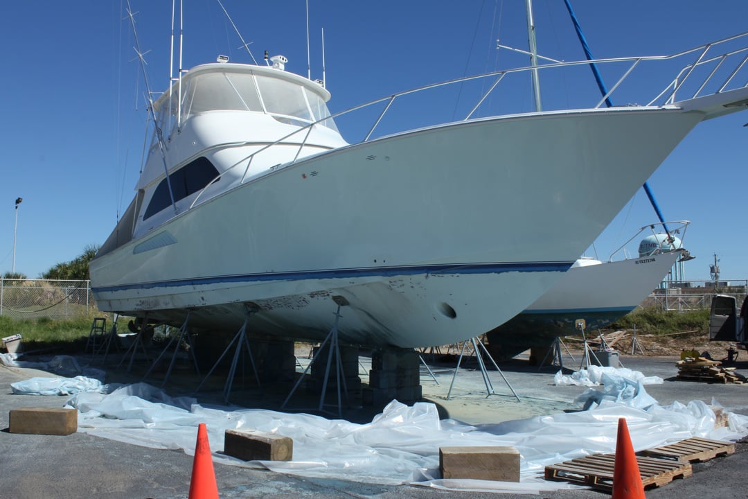 yacht on stilts stripped of paint
