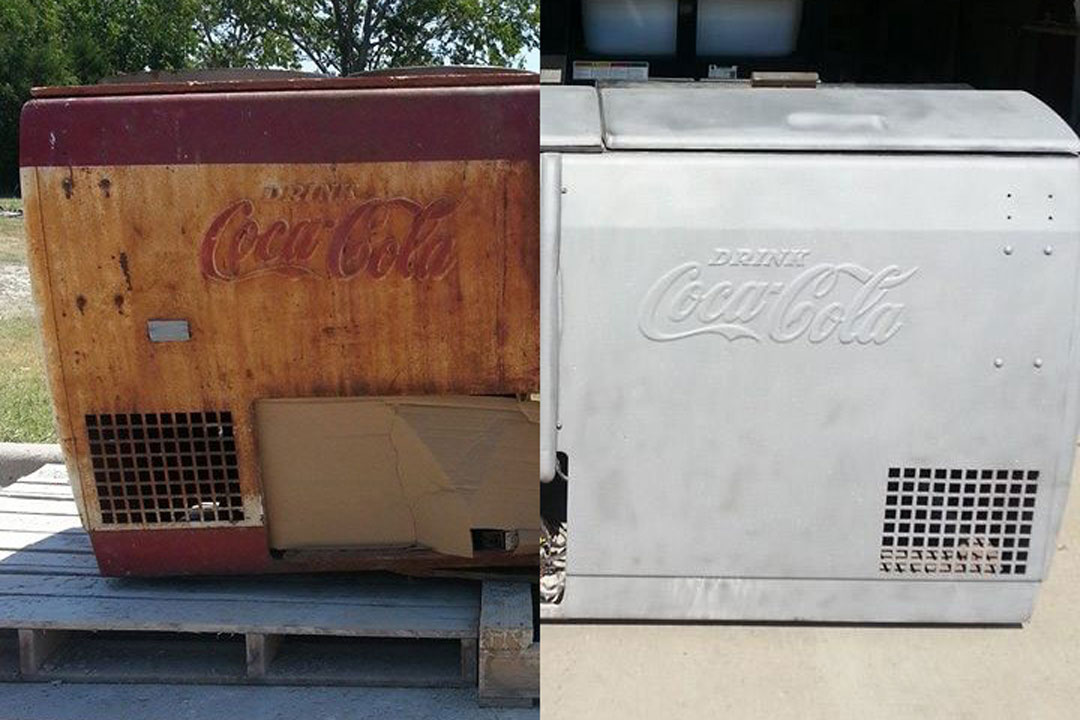 old rusty coca cola cooler restored