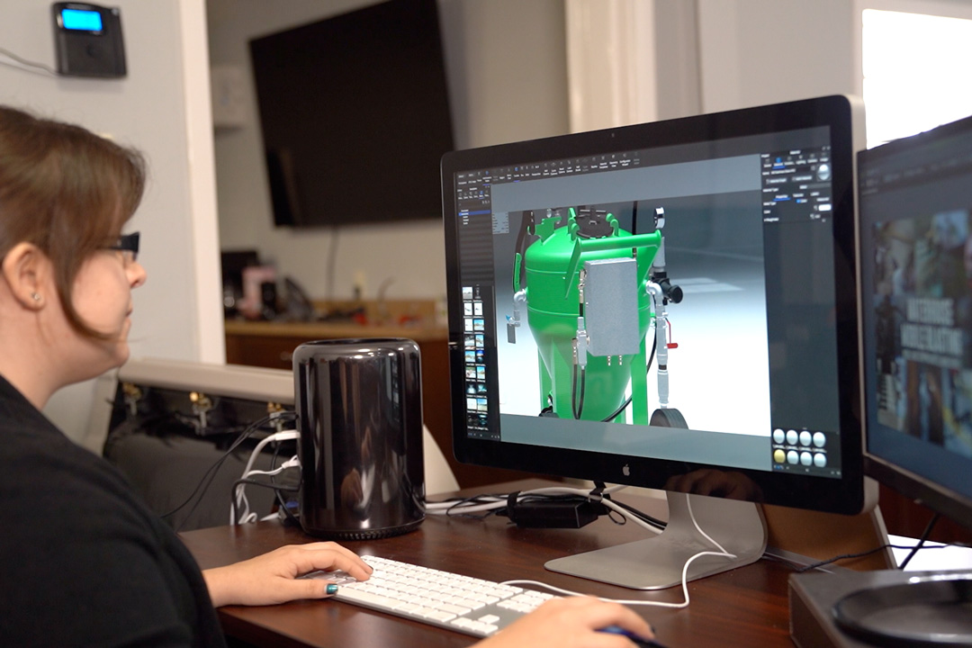 woman creating a 3d model of abrasive blast pot