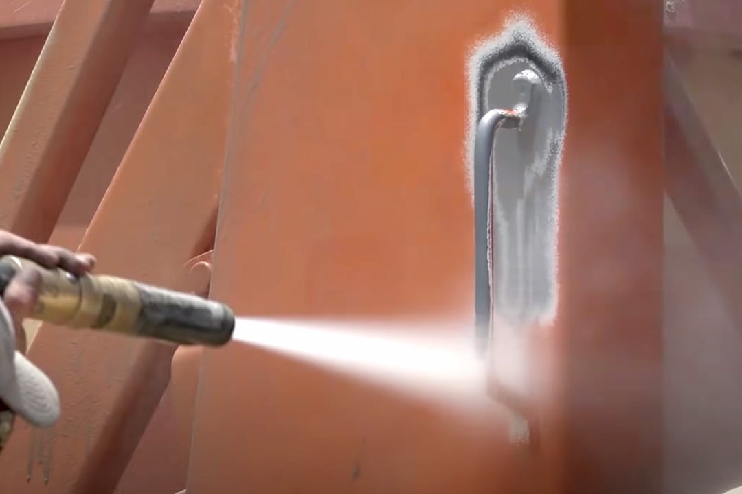 paint removal from handle on industrial equipment